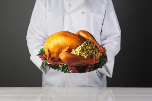 chef holding turkey