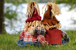 scarecrow by lake